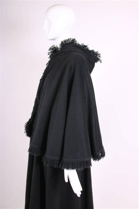 ysl fringe black wool cape|1970's Yves Saint Laurent YSL Black Wool Hooded Cape Coat .